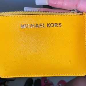 Gently used Michael Kors small wallet keychain